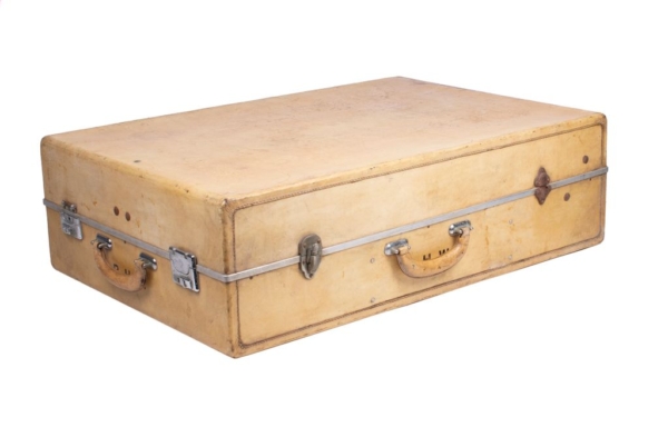 Light-colored leather suitcase with silver hardware Dorantes saddlery