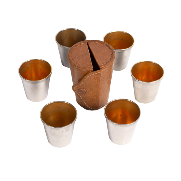 Set of 6 antique glasses, in silver and engraved with the signature "CROSS", golden interior and has an original leather case in light brown.