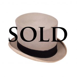 Vintage top hat with a grey cup and black ribbon The top hat is signed by “LOCK & Co, ST. JAMES ST. " Dorantes saddlery