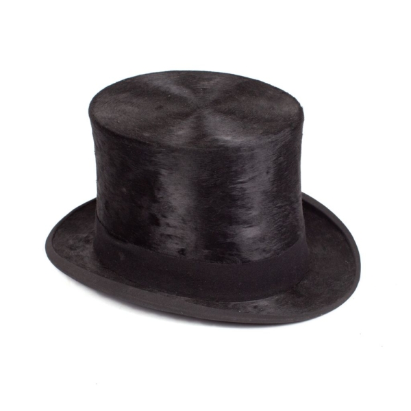 Vintage top hat with a black cup. The top hat is signed by “HANBIDGE, NORFOLK HOUSE." Dorantes saddlery