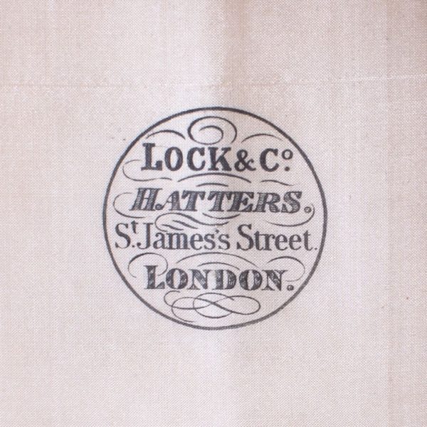 Black top hat signed by "LOCK & Co, HATTERS, ST. JAMES ST., LONDON"