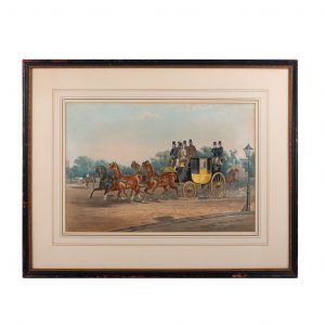 Set of two pictures with pictures of carriages. Noble wood frame with decorated brass trim.