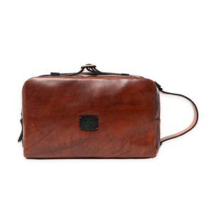 Toiletry bag ideal for travellers vegetable tanned leather and metal fittings