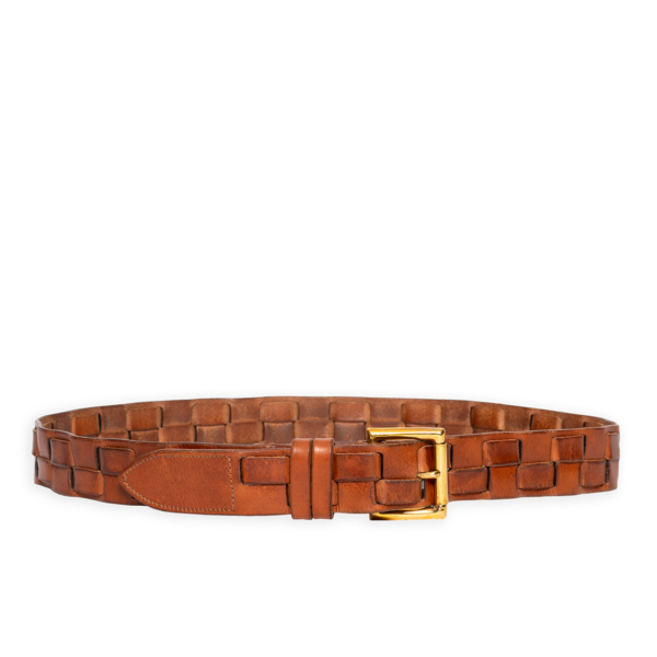 Vegetable tanned leather belt characterized by the handmade braiding